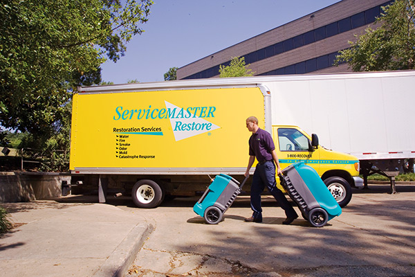ServiceMaster Technician with ServiceMaster Truck